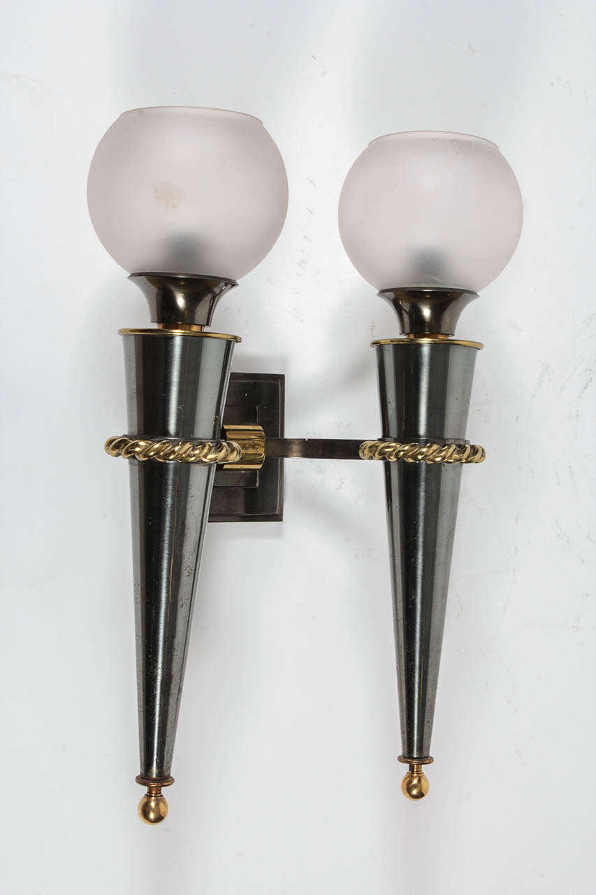 Mid-20th Century Pair of Sconces by Gilbert Poillerat