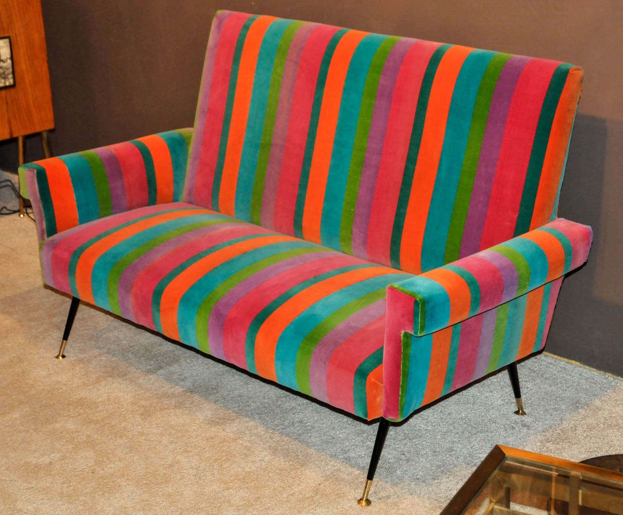 1950's sofa in black lacquered metal and brass. Multicolor stripes velvet fabric. Very good condition. Normal wear consistent with age and use.