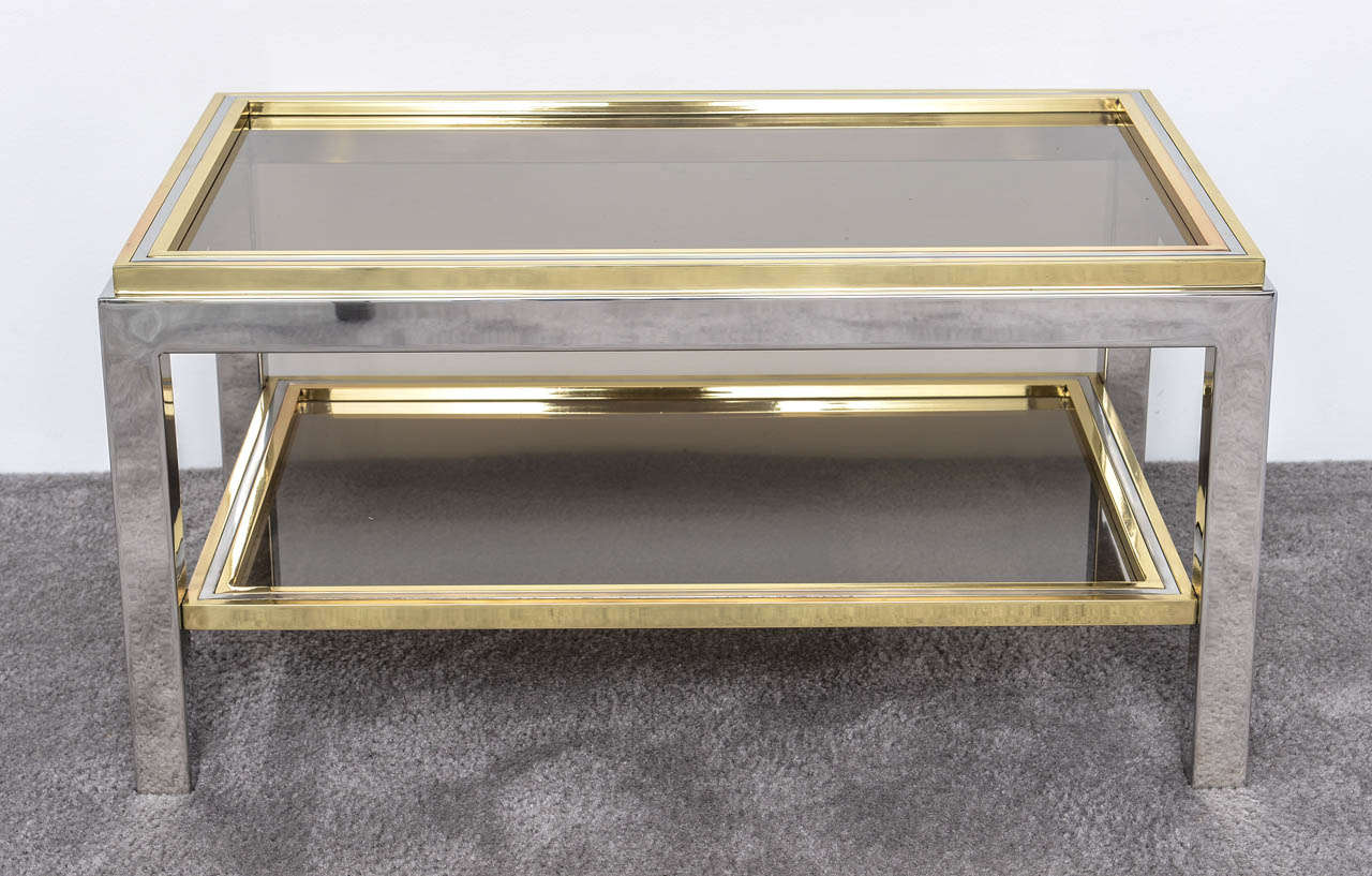 Two colored metals: Brass and chrome. Two levels, very strict and elegant lines. Perfect proportions and elegant design.
In the style of Romeo Rega and Willy Rizzo.
Italian Mid Century .