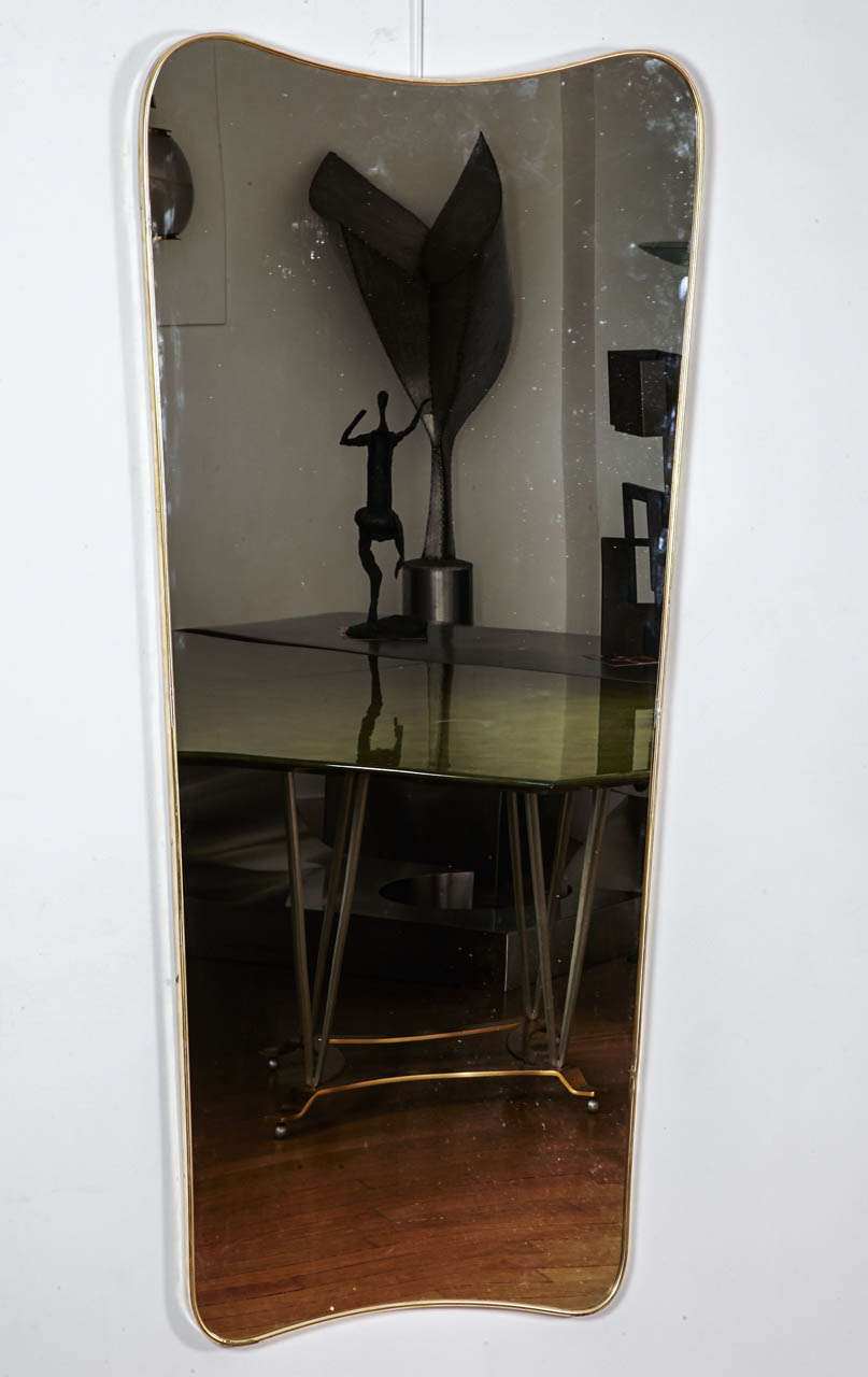 Pair of high gilt brass framed mirrors, by Gio PONTI, Italy, 1950’s
Wood structure.

Prov : Hôtel Bristol, de Merano.
Réf : Rivista dell' Aredamento Août 1957,  n°52, Similar page.21.
Réf : Archive Gio Ponti.