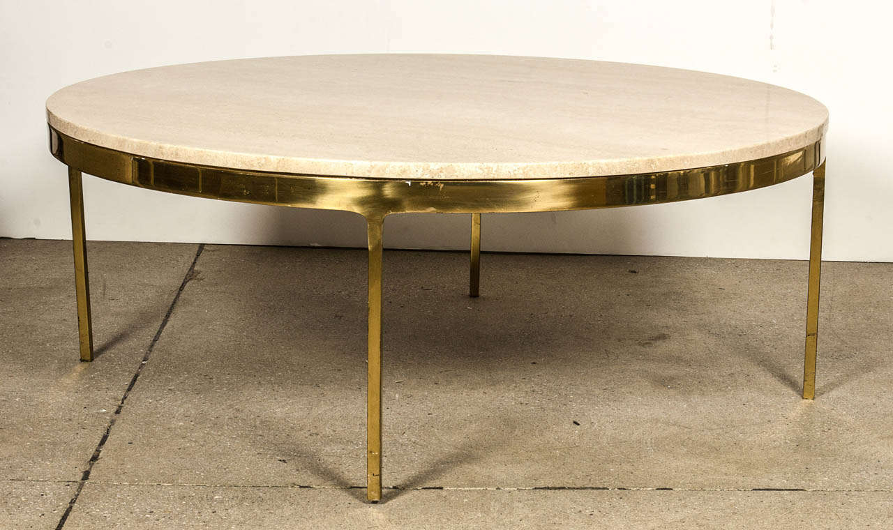 Exceptional 1970's chic brass framed coffee table with a polished travertine top by Nico Zographos.