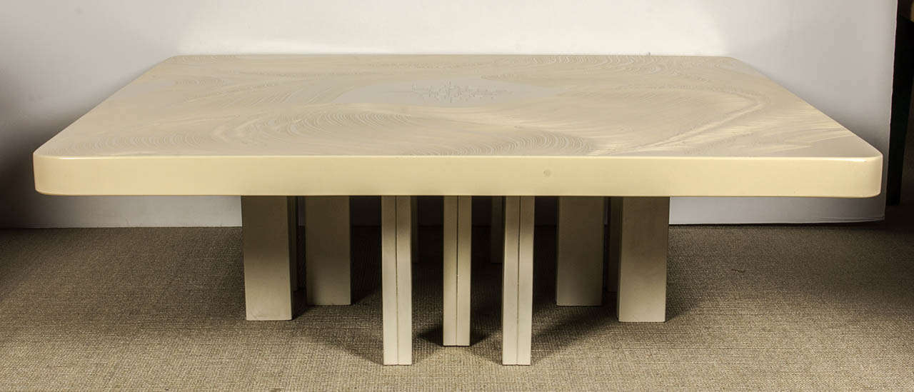 a modernist square coffee table by Fernand Dresse,in cream resin and bone, steel foot.