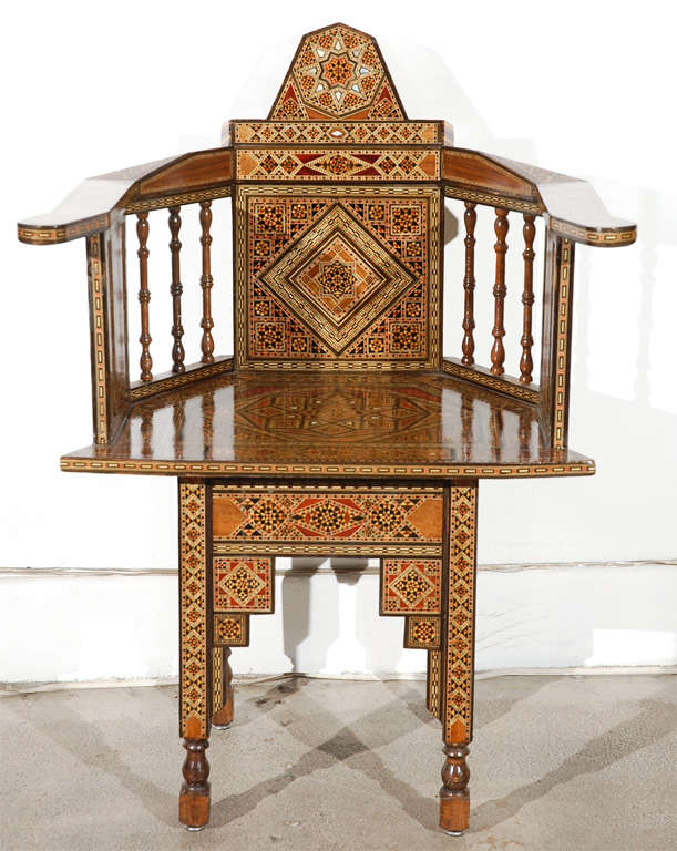 Majestic mosaic marquetry Damascus pair of Syrian armchairs beautifully patterned with intricate inlay of tortoise shell, various exotic woods and mother-of-pearl.

Mosaik provides Antiques,Art Deco, Moorish Style, Spanish, African, Islamic Art,
