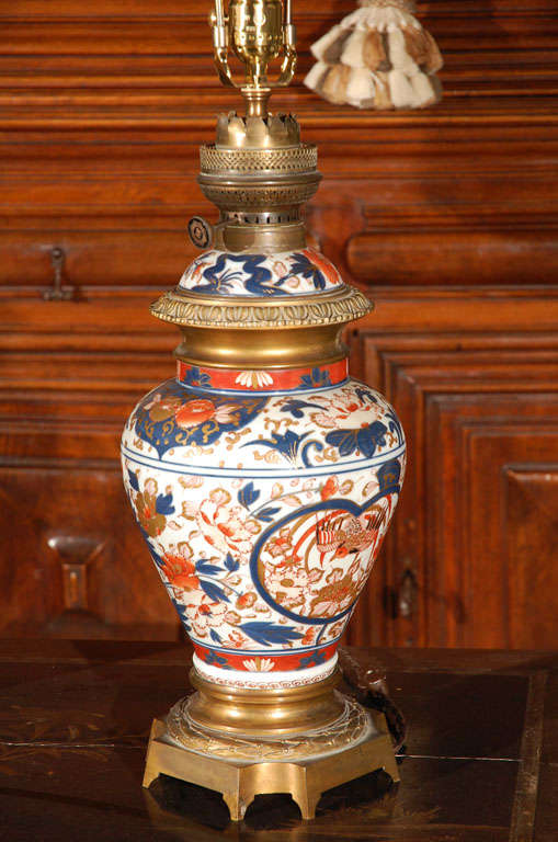 Bronze Antique Pair of Imari Lamps For Sale