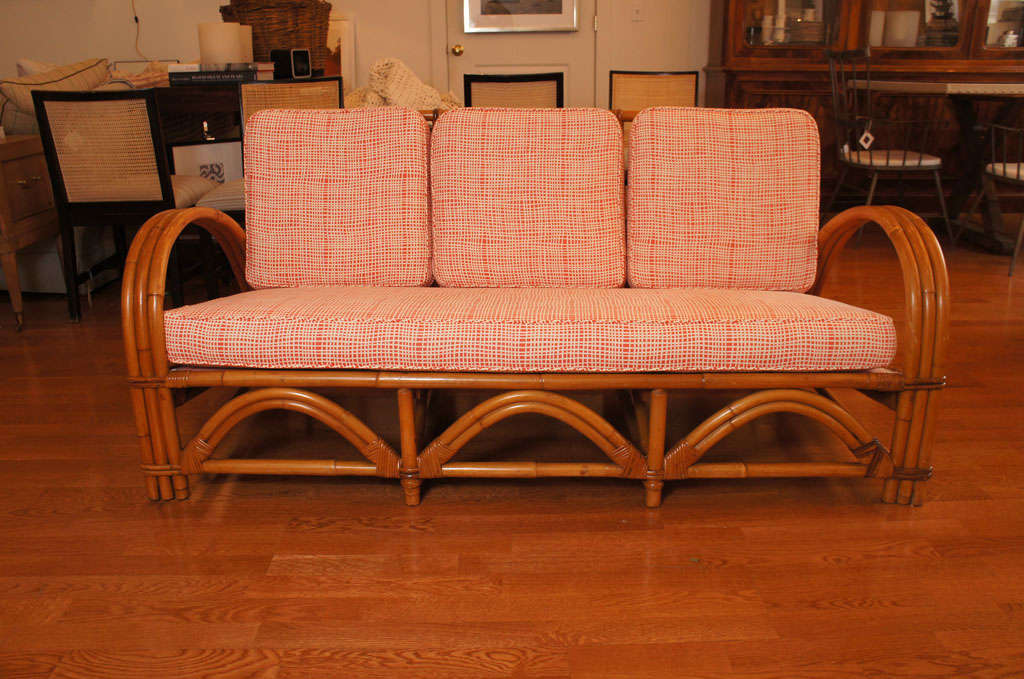 lovely, rattan sofa
newly upholstered in a fresh and perky, salmon and cream patterned fabric.
also available: four matching chairs and ottoman.