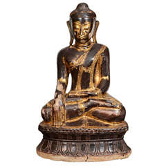 Alabaster Seated Buddha in Black and Gold Hues