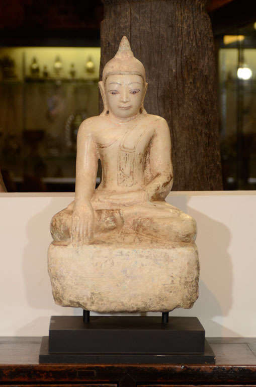 Carved Alabaster Buddha, Seated. Mounted on Iron and Wood Base

JC - 5