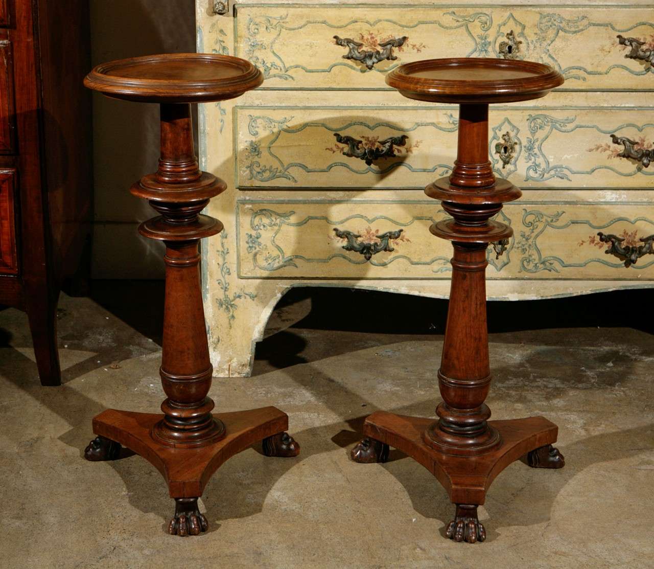 Charming pair of hand-carved, 19th century, walnut side tables with claw feet.
