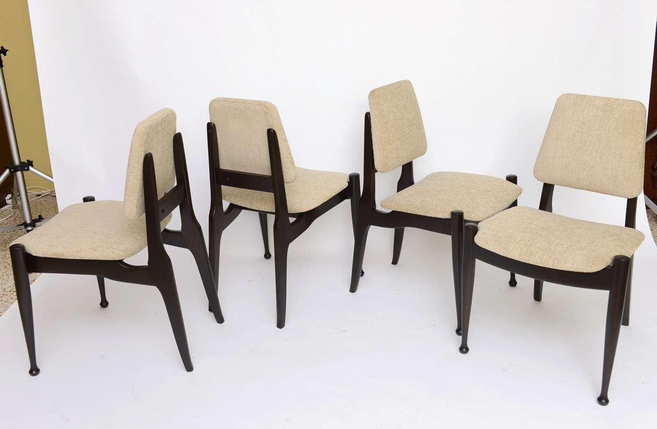 SOLD So sculptural this set of four Greta Grossman style ebonized teak dining chairs from the Lustig Brothers.  Freshly restored and upholstered in fawn velour velvet.  The shaped seats and backs are delightful....the backs with tubular brass