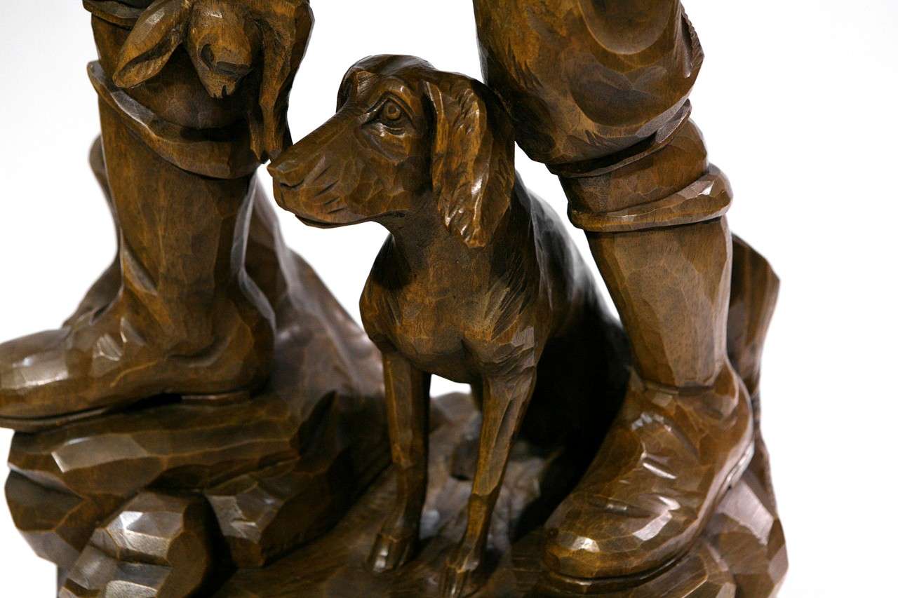 man and his dog carvings price