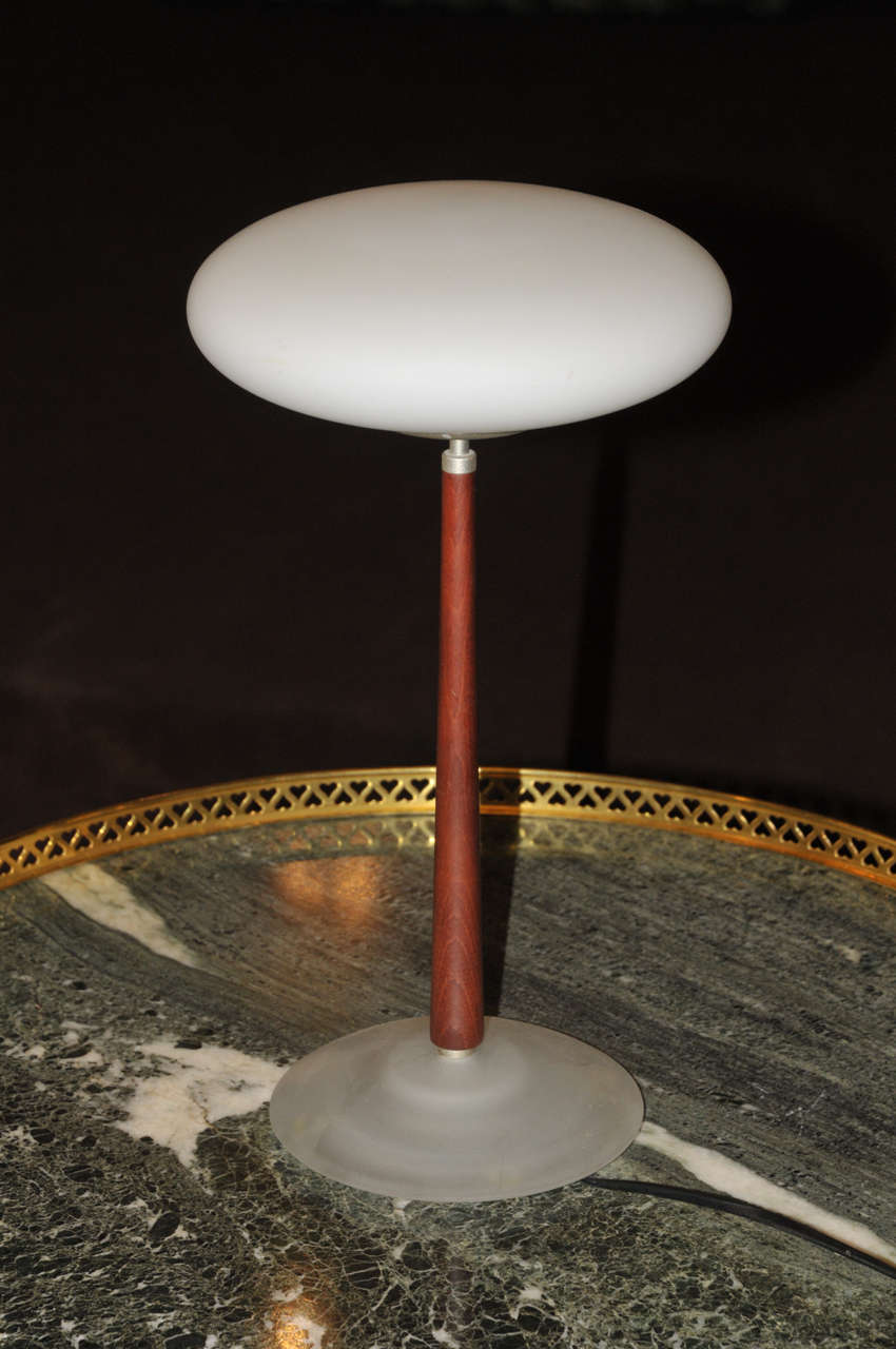 1970-1980 lamp edited by Arteluce in frosted glass and wood. Wired for European use.