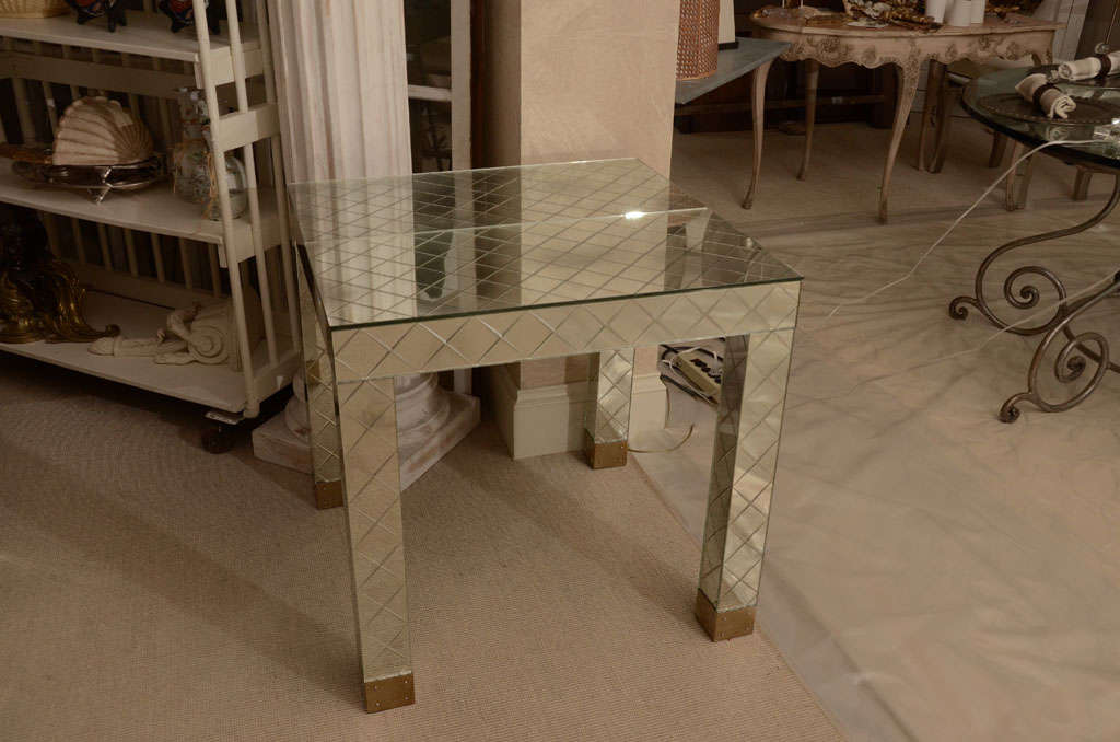 Attractive and striking pair of mirrored occasional tables