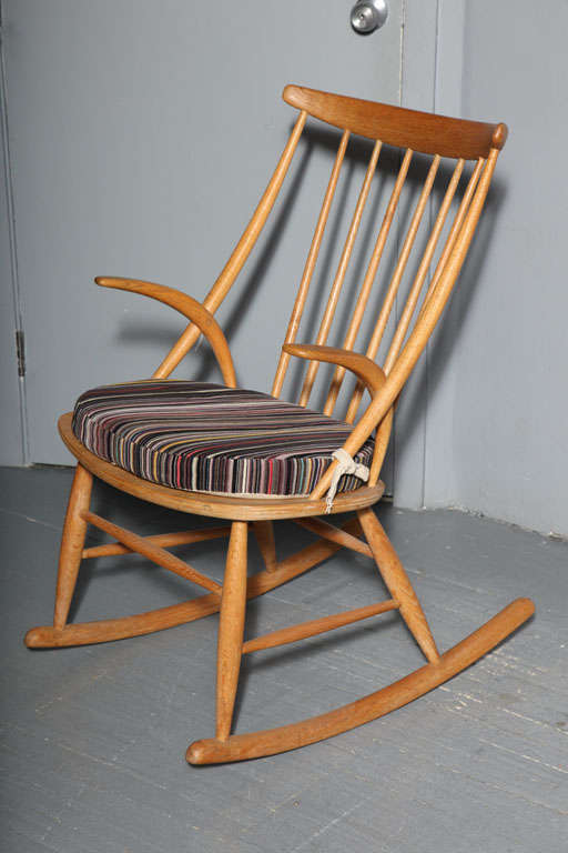 Vintage 1950s Danish Modern Oak Rocking Chair by Illum Wikkelso. Vintage Decor. 

Danish Country style Oak Rocking Chair by Illum Wikkelso. Features a spindle back and tusk-like armrests that evoke warm and organic design elements. Removable