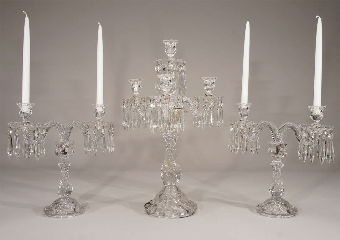 This dramatic 3 piece set of molded crystal candlesticks will fill the largest table with light and elegance. The center candlestick is 23 1/4