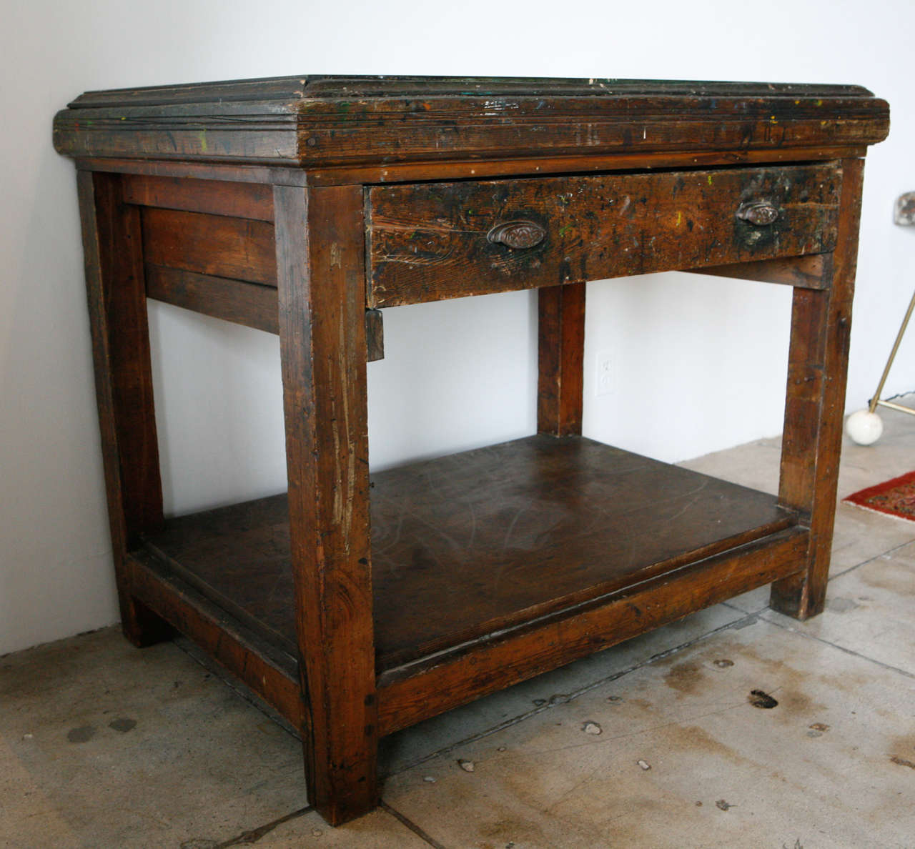 A formidable printers table from France with a bluestone slab worktop.