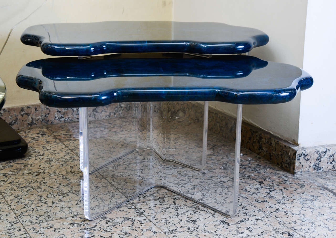 Rare set of two tables in blue parchment on lucite base
Dimensions for the small one : 75 x 50 X 37