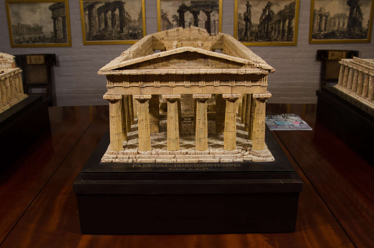 Made by hand by master model maker Dieter Cöllen of Germany. The cork model on a metal base, resting on a rectangular stained mahogany platform. The metal base inscribed on the front 'PAESTUM-POSEIDONTEMPEL/ 0-5 m scale'. The reverse side inscribed