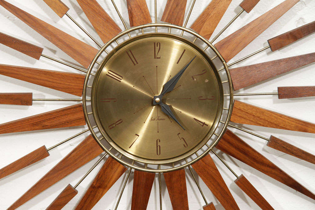 It's time!  Nicely articulated, walnut and brass, quartz clock recently refinished.  Located at LV2 113 Stanton Street.