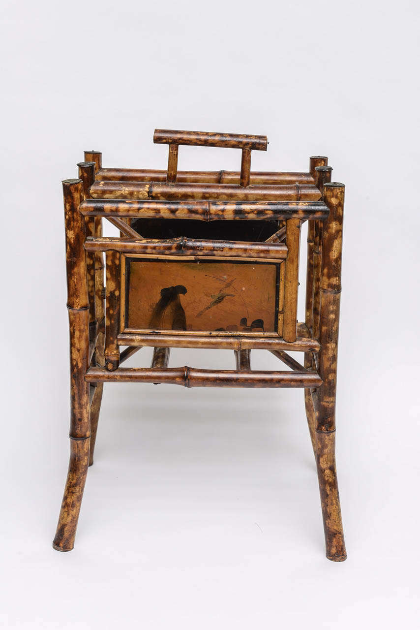 A charming small 19th Century English Bamboo Magazine Rack. Very unusual because very small.