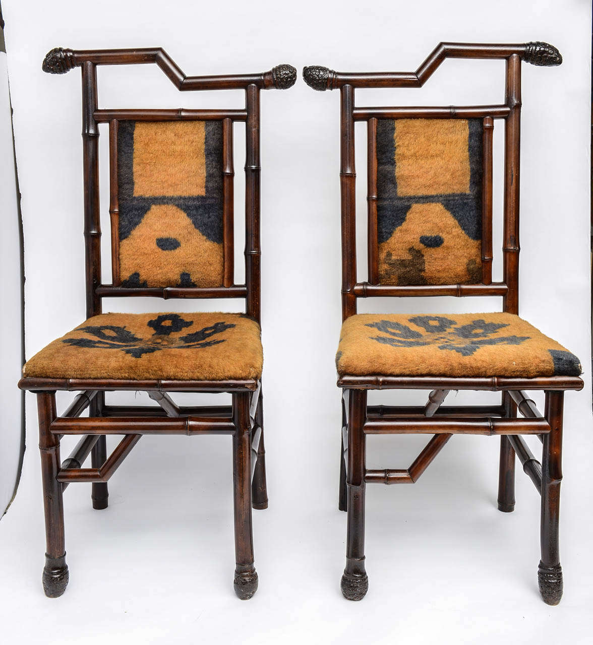 A unique chance to own both a part of English and American History. A very interesting pair of 19th Century English Bamboo chairs form the Palm Beach home of Lilly Pulitzer wonderful root details, as well as,  very original printed pattern fur