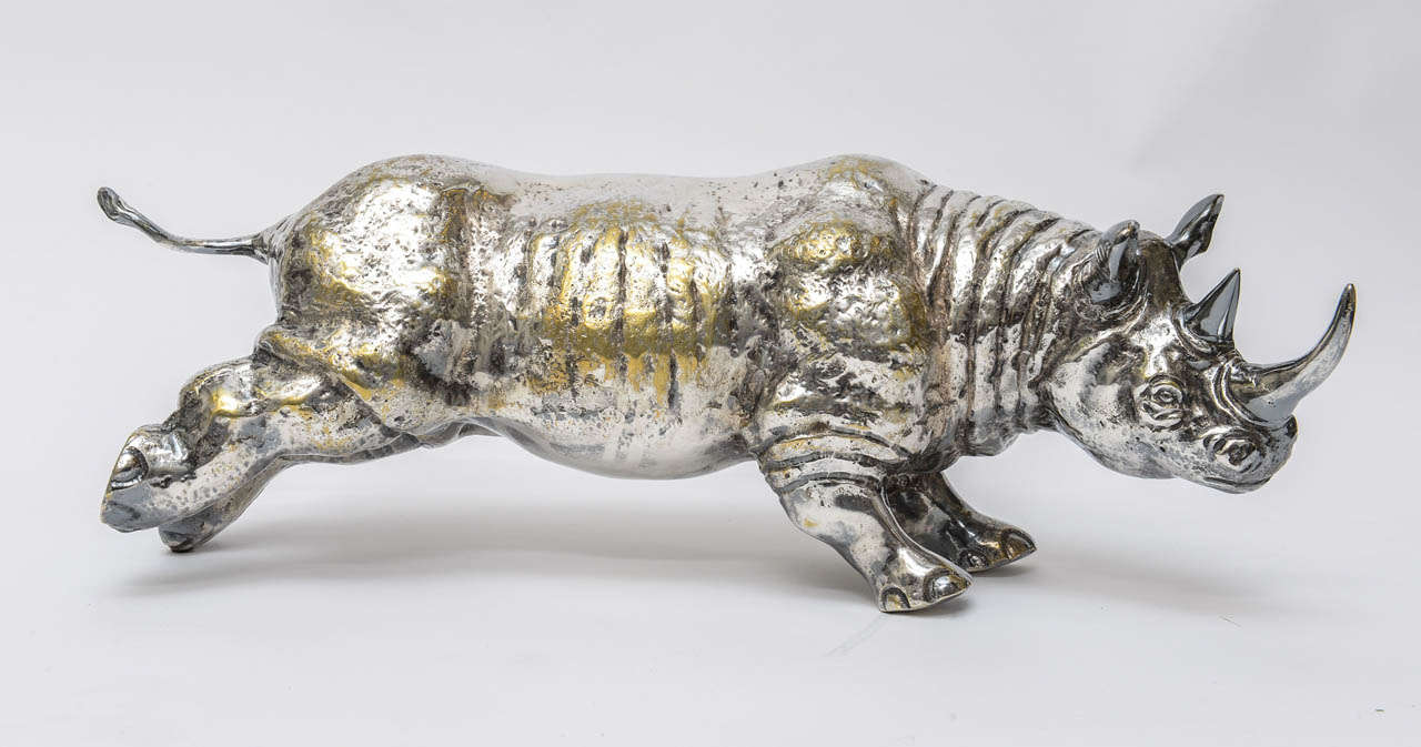 Fabulous large Silver on Bronze Rhinoceros sculpture. This animal is very vivid it looks so real!
Great patina, no loss of Silver.
This is a heavy fellow, he weighs 15 pounds.