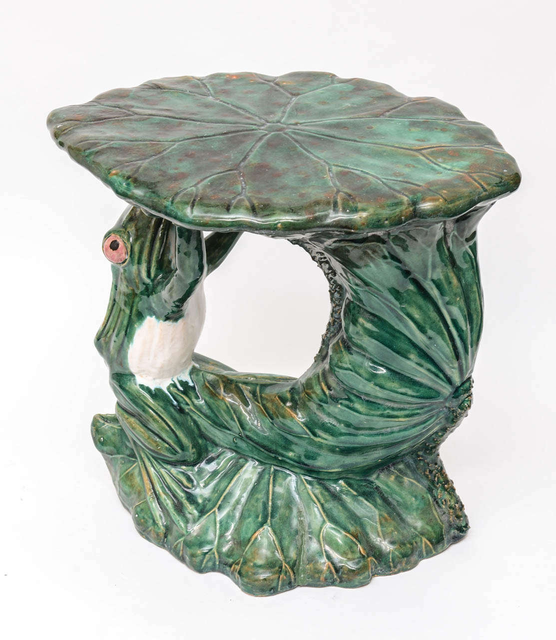 Charming and whimsical frog on lily pad garden seat.