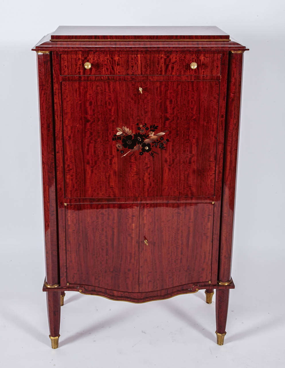 exceptional secretaire by JULES LELEU, circa 1940. signed inside door.
Mahogany. Marquetry of ebony and mother of pearl drawing a feather and flowers
bronze sabots on the four feet
inside sycamore and leather
lighting .