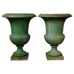 Pair of tall XIXth century garden planters in painted cast iron, French