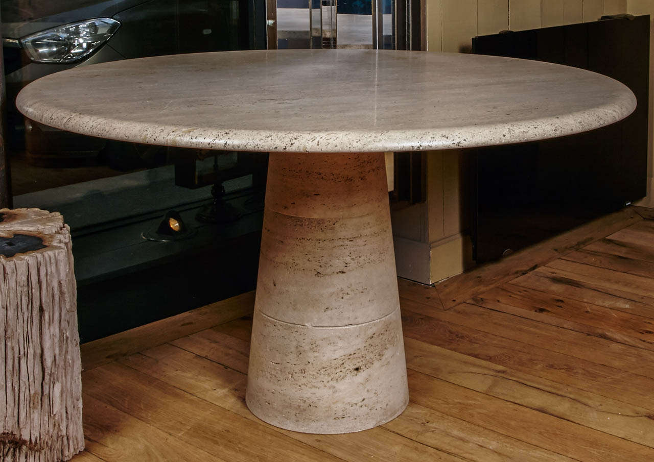 Conical base in solid travertine and round top with a polished finished.
From italy ca.1970. The top is very stable on the base. Perfect for a dining table or a center piece.