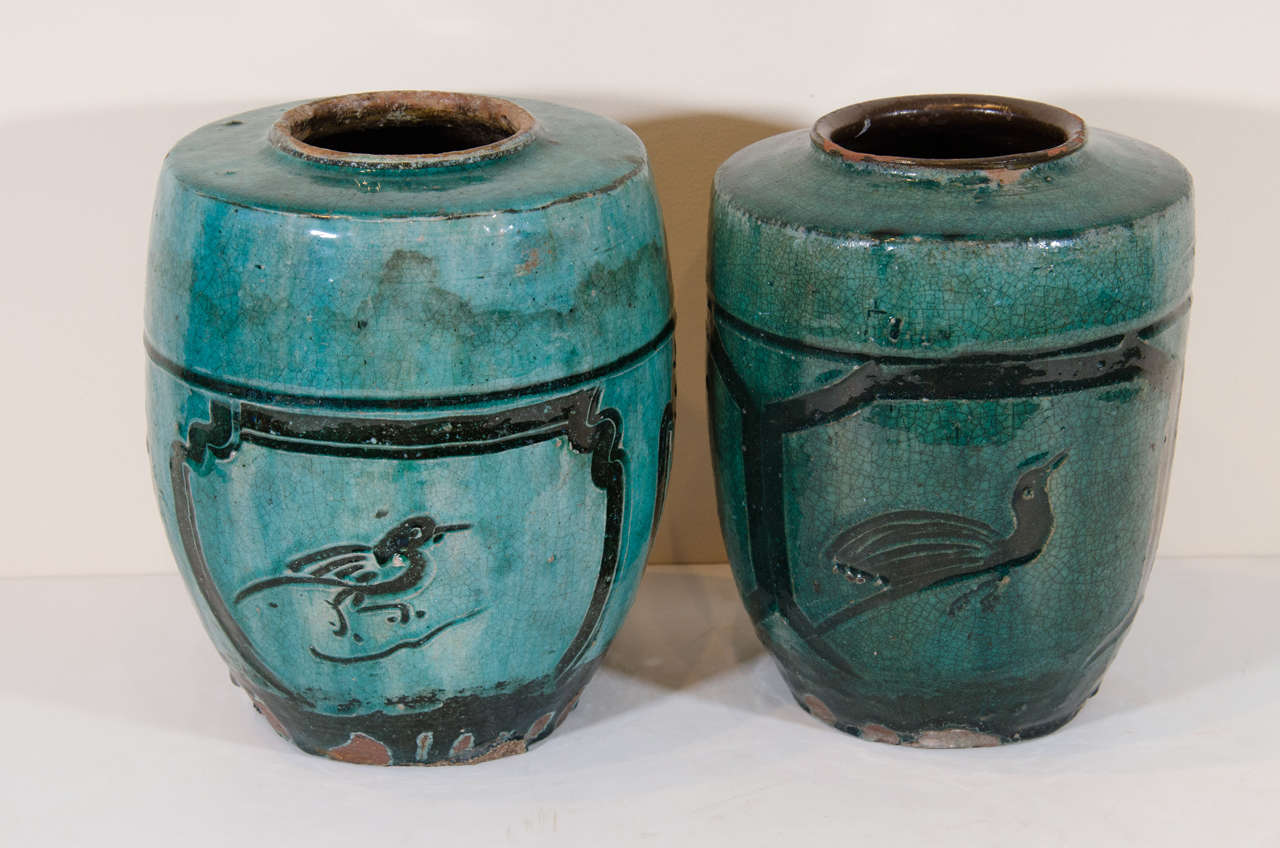 Antique Chinese ceramic jars with beautiful bird imagery and striking blue/green glaze.  From Hunan Province, c. 1850.  Sizes vary somewhat, contact shop for details. Priced individually.
CR724