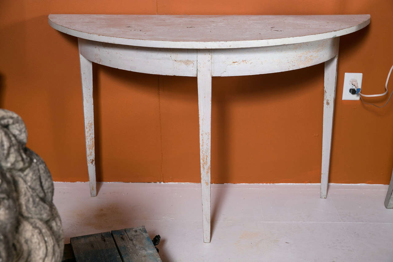 A pair of 18th c. Swedish Demi Lune tables with original paint.