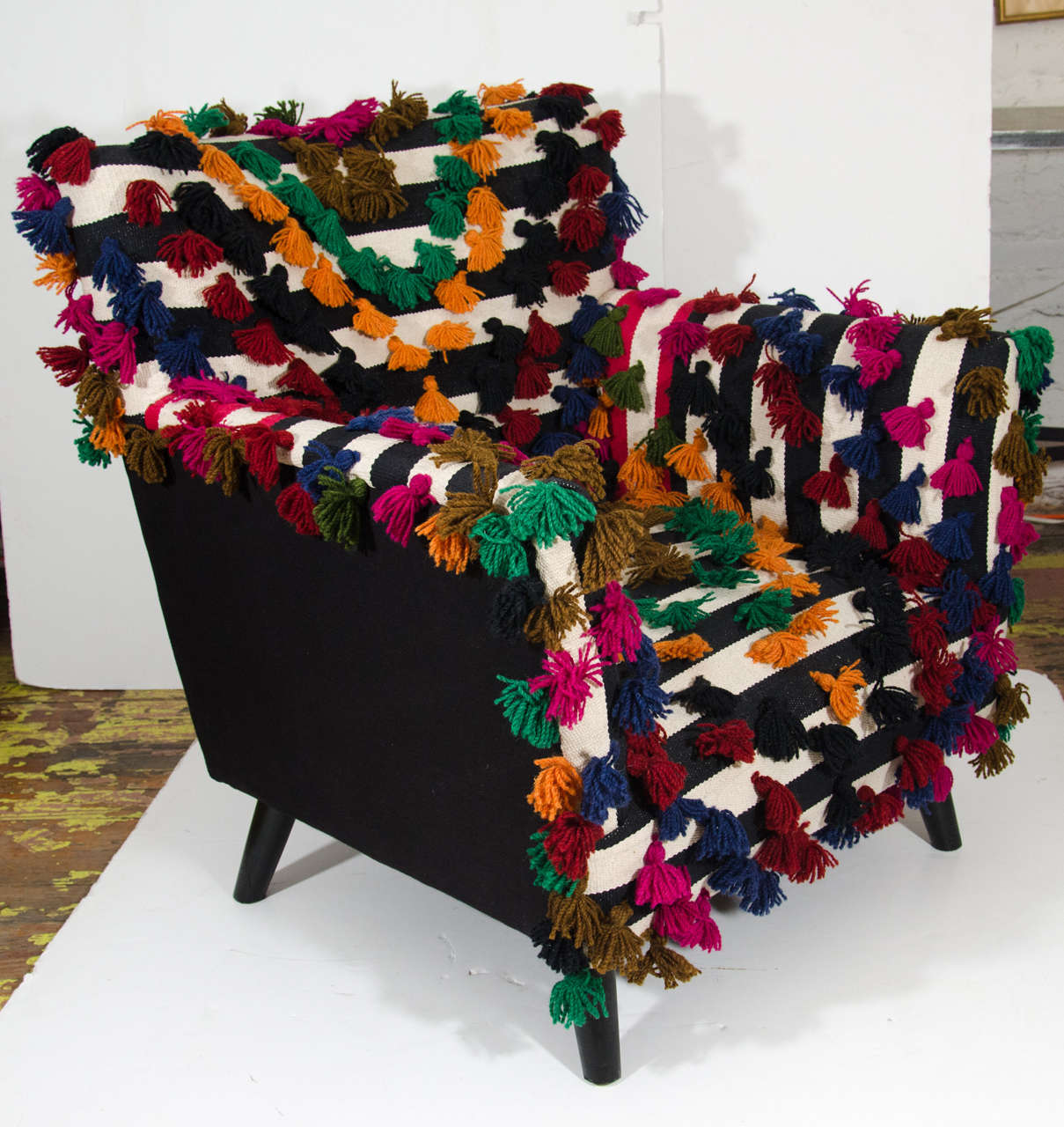 Indian Dhurrie chair with colorful pom-poms, 21st century.