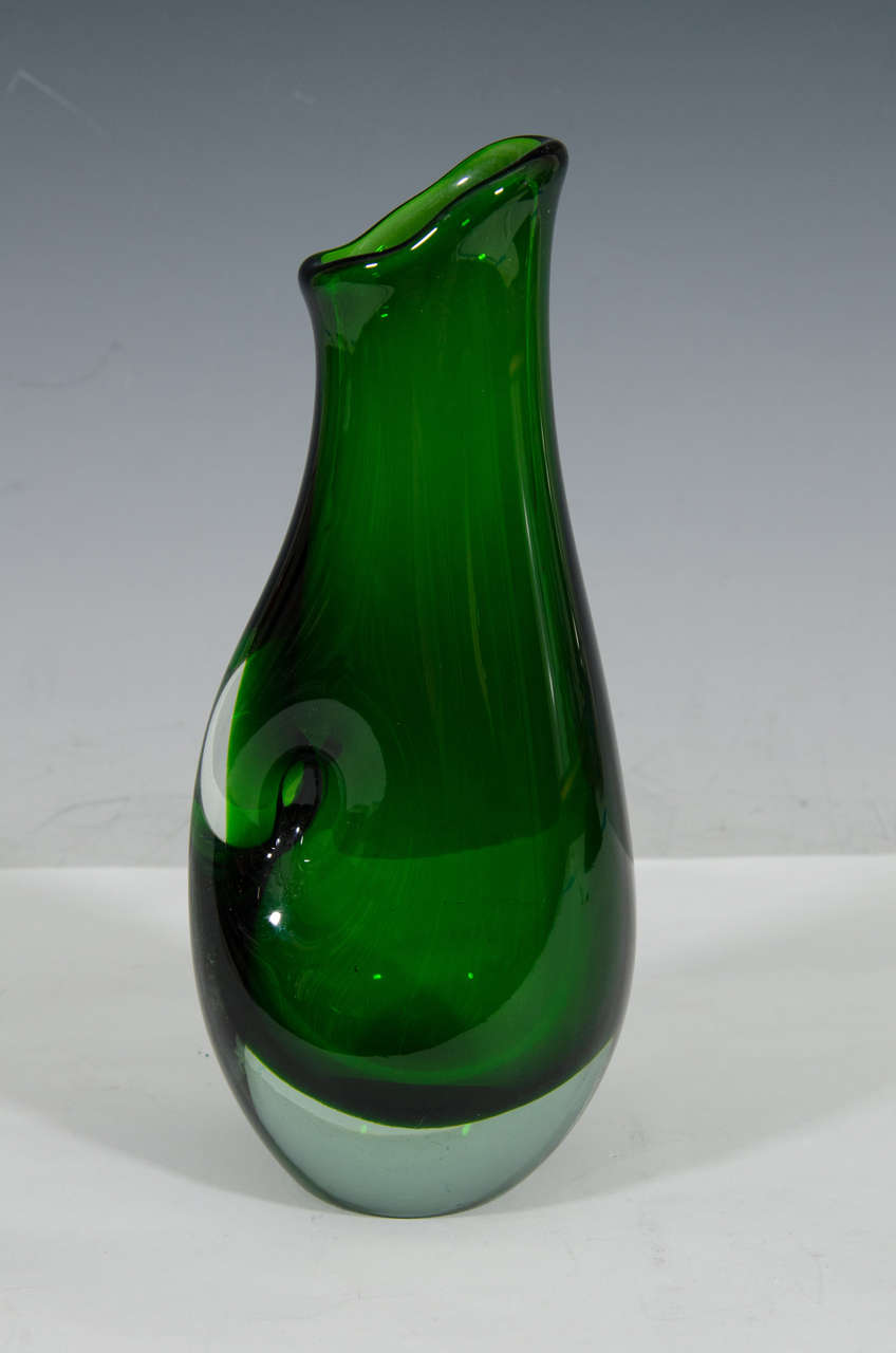A vintage Murano glass solid sculptural vase in green with clear base. Good vintage condition with age appropriate wear. Some scratches.