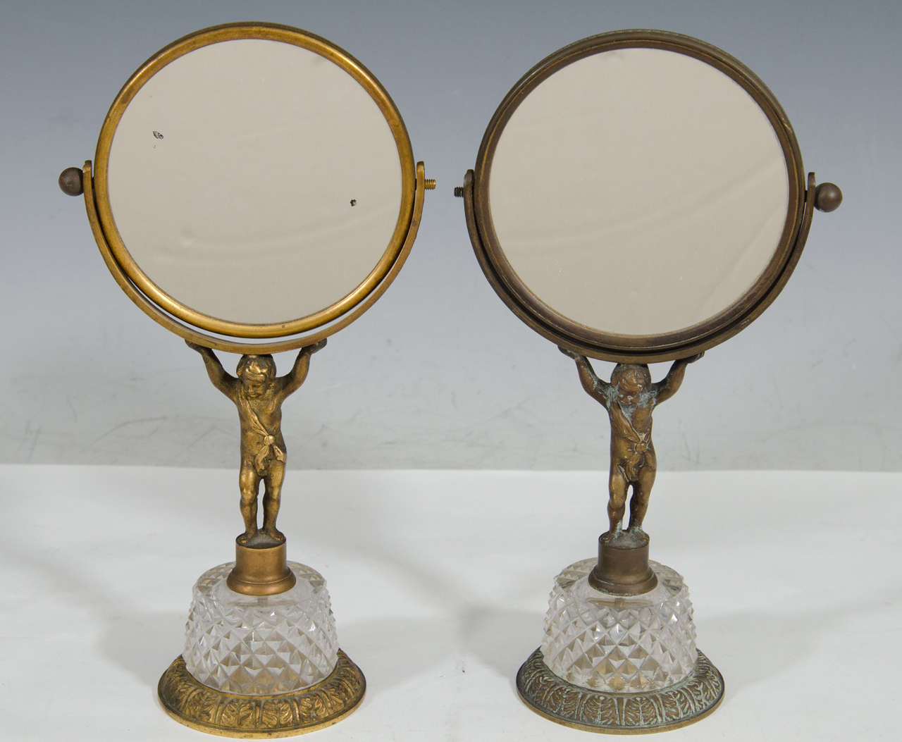 Antique Pair of Bronze and Crystal Cherub Vanity Mirrors