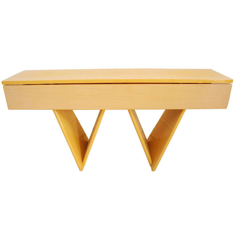 Blond midcentury lacquered drop-leaf table.