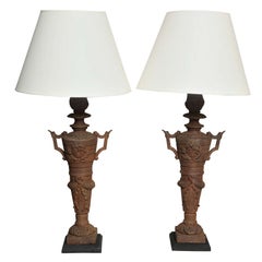Two Pairs of Napoleon III Cast Iron Lamps