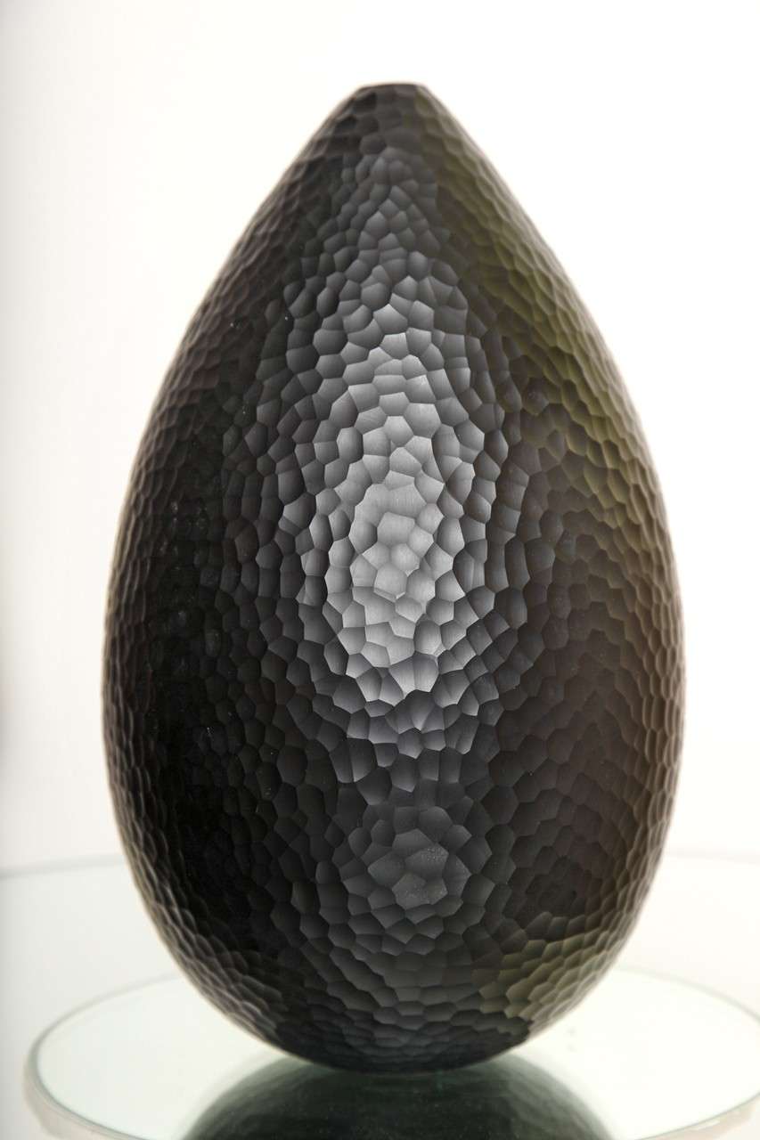 Ben Edols (b. 1967) and Kathy Elliot (b. 1964)
Black glass vase with faceted surface and small opening of flowers.
Signed on bottom.
Australian, circa 1990.

