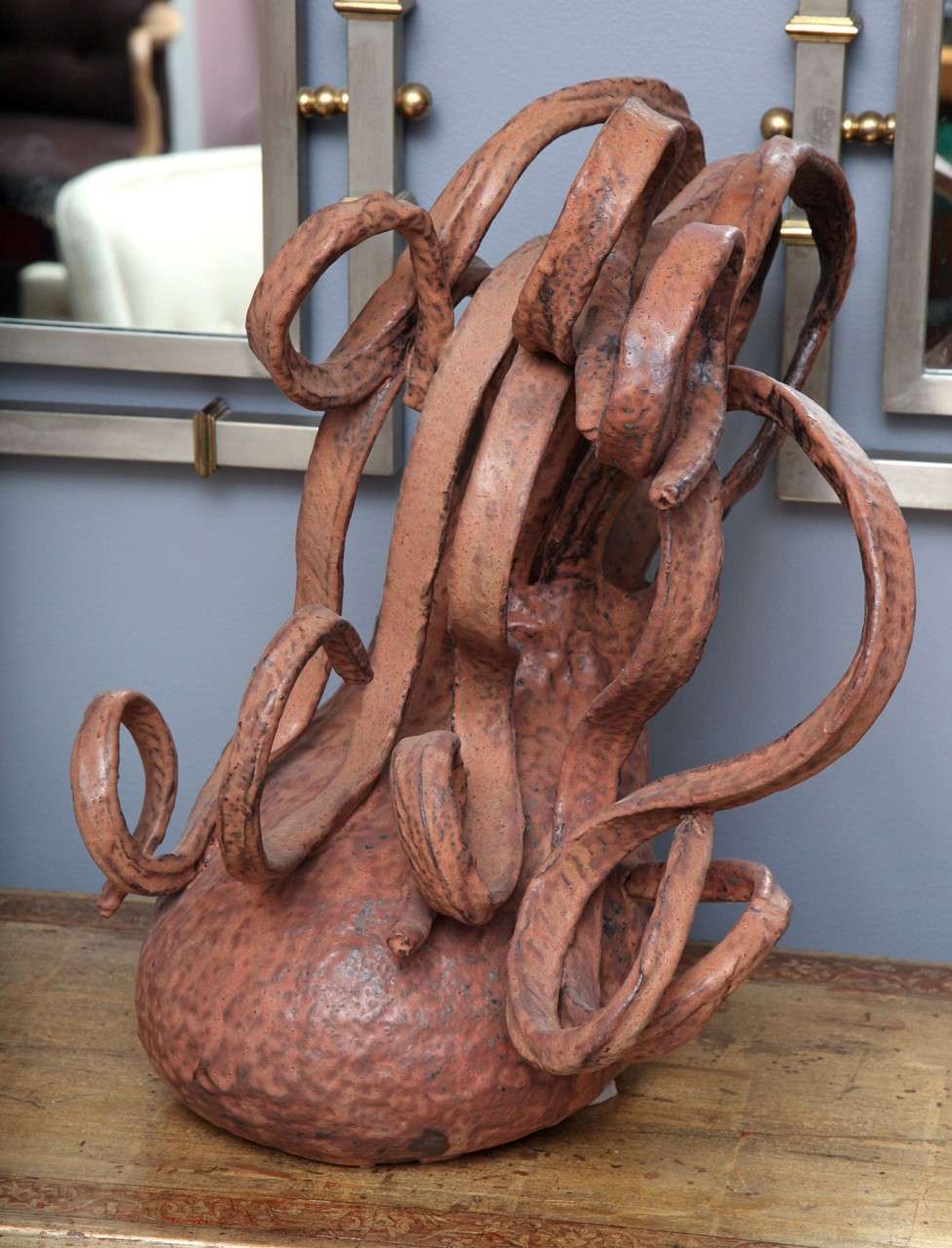 PETER SCHLESINGER (b. 1948)
Hand-built ceramic vessel in the shape of a stylized squid with tentacles. Glazed in a deep rust satin glaze.
Signed and dated: Peter Schlesinger 1993
American, 1993