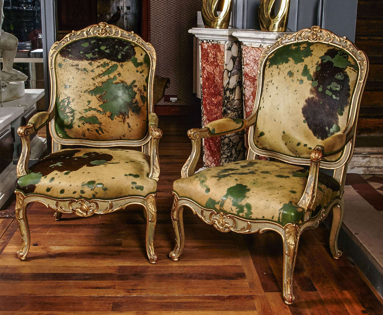Set of four green lacquered and gilt wood armchairs, genuine patina, Regence style, upholsetred with coloured cow leather, sold by pair.