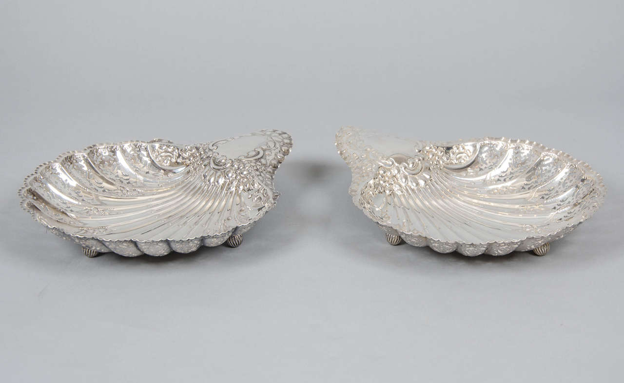 Pair of silver scalloped shell dishes, Sheffield, 1903 and 1898. Maker HA. Hallmarked.