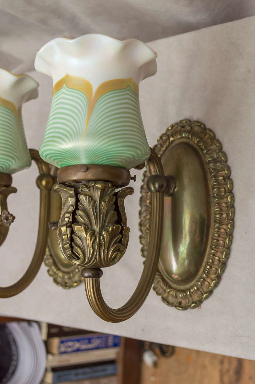 Art Nouveau Pair of Bronze Sconces with Art Glass Shades