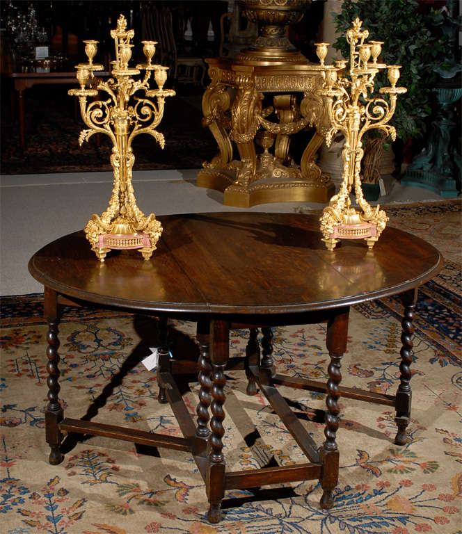 Incredible pair of exquisite mercury gilded bronze and pink marble candelabra with superb chasing
CW3819
