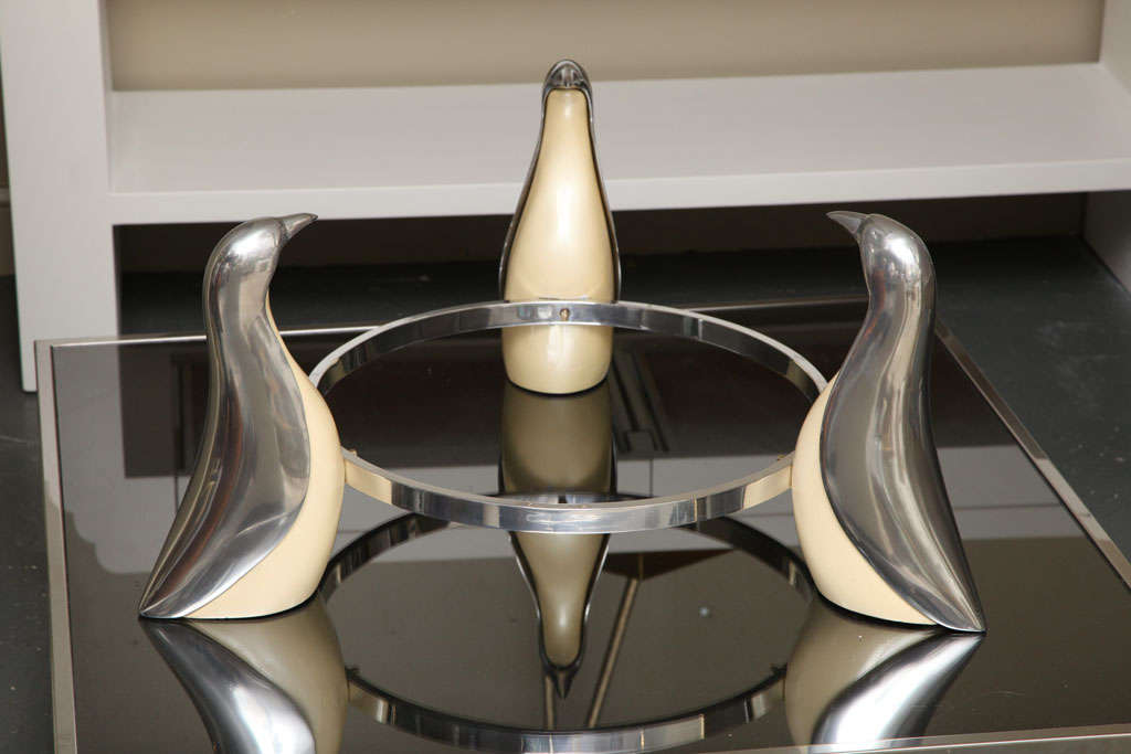 DELIGHTFUL COFFEE TABLE DONE IN ALUMINUM AND WOOD DEPICTING THREE PENGUINS.  GLASS NOT PICTURED IS 36
