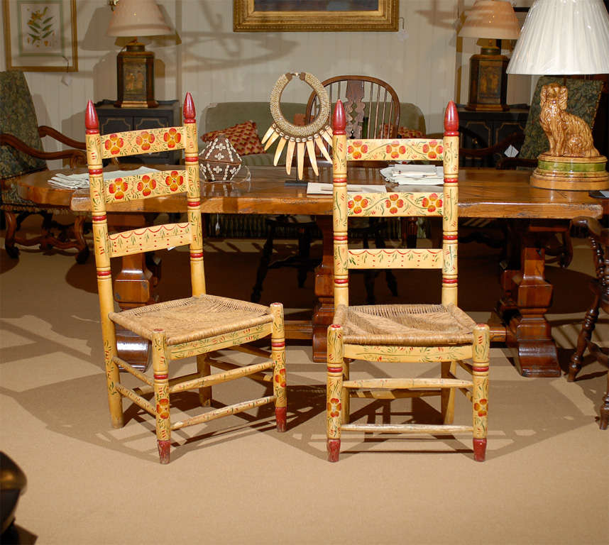 Pair of Pennsylvania Dutch Painted Ladder Back Chairs, early 20th century.