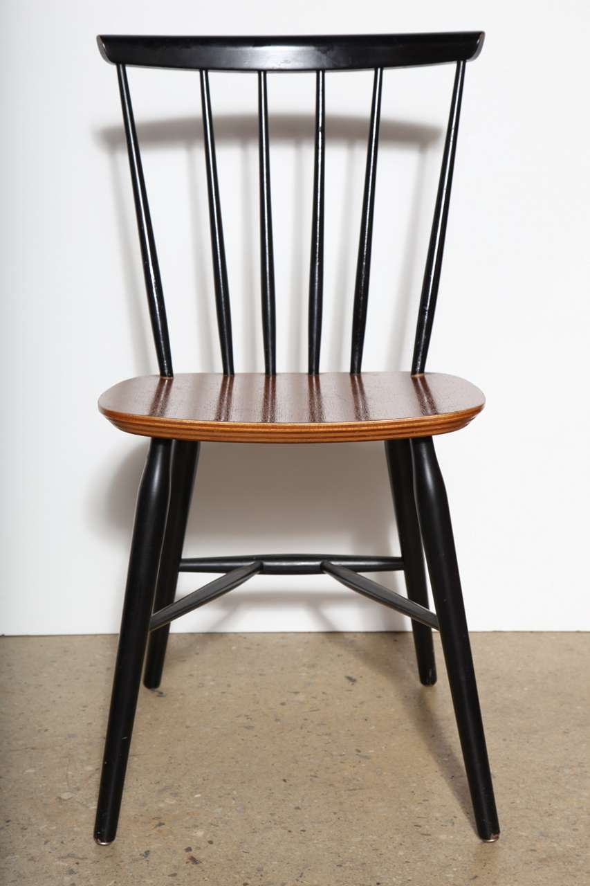 6 Danish two tone Teak and Black Lacquer Side Chairs or Spindleback Dining Room Chairs.  Teak seat with Black Lacquer Stickbacks and legs. 4 chairs with runners and 2 without.  Great for Kitchen Chair use.  Willing sell separately