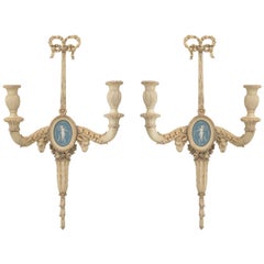 Pair of 19c. Carved Wood Sconces Centered by Wedgewood Bisque Plaques.