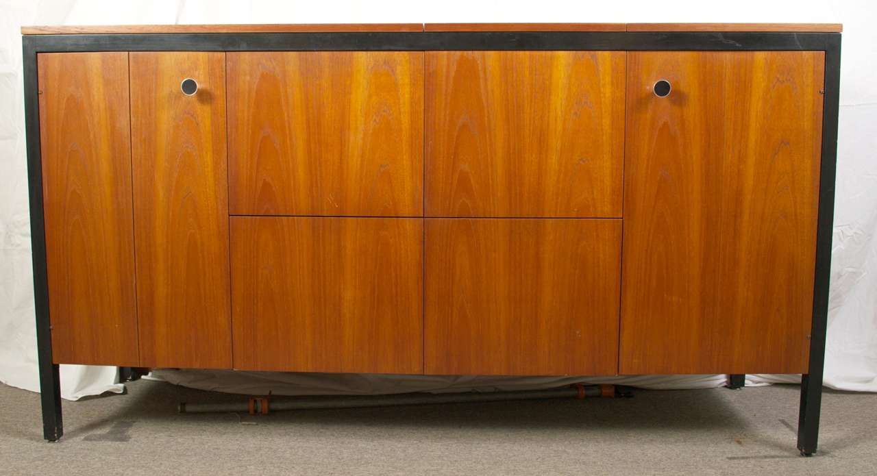 Very unique and rare, George Nelson design.
The Herman Miller 1961 catalogue (page 11), describes the piece as #0215 Stereo Sound Cabinet part of the 0200 case series.This was the second most expensive item in the 1963 Herman Miller catalog.
Teak