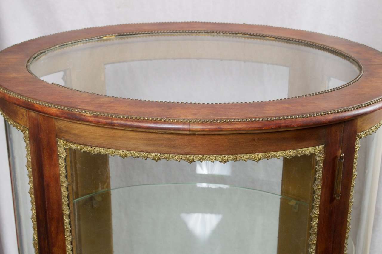 round curio cabinet