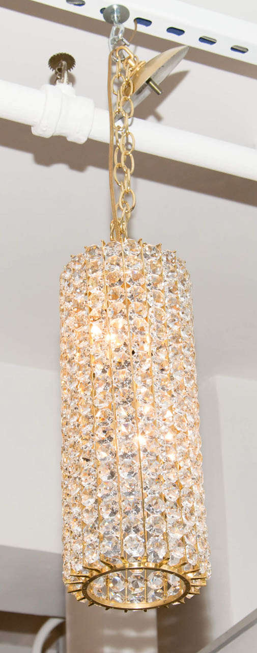These pieces will add a little sparkle to any room.  They are from Austria, and are composed of hundreds of faceted crystal beads on a brass cylindrical frame.  They have been re-wired for use in the USA.  Priced separately.