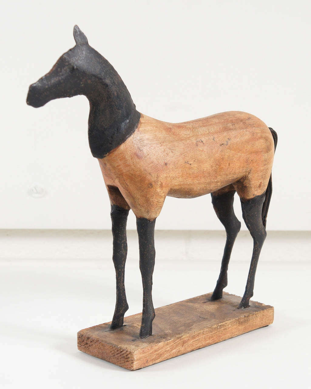wood horse sculpture